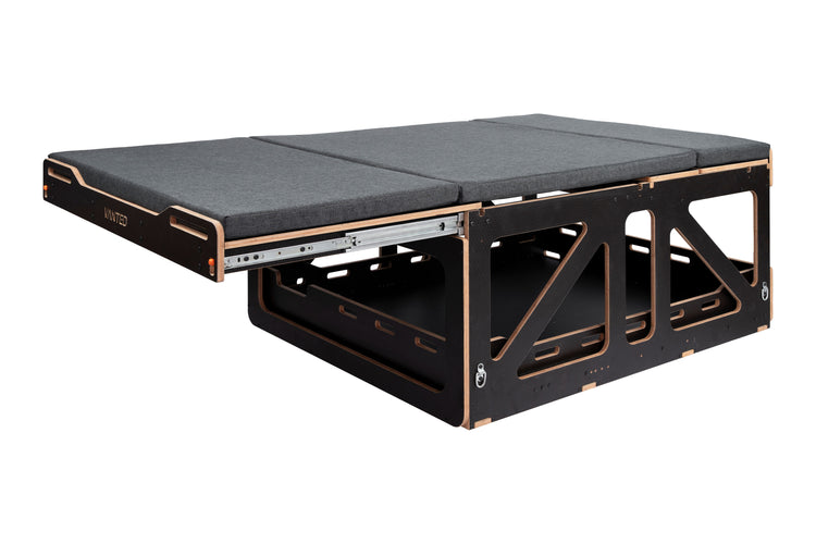 Vanted Cross fully opened — bed platform and storage drawer extended simultaneously, modular van kit