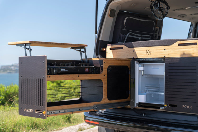 Rover Pod’s innovative sliding kitchen and bed system, built with light, resilient materials for van conversions.