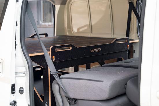 Vanted Cross installed in Toyota Hiace — side door view showing pod fitted to LWB cargo area
